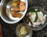 A picture of step 1 of Rohu fish in banana leaf.