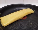 Une image de l'étape 13 de Tamagoyaki (omelette japonaise sucrée).