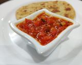 A picture of step 2 of Bengali style tomato chutney.