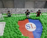 Foto del paso 13 de la receta: Torta de cumple "Cancha de fútbol"