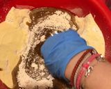 A picture of step 6 of Christmas cookies dipped in honey, aka melomakarona.