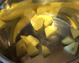 A picture of step 1 of Spicy Apple and parsnip soup.