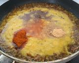 A picture of step 8 of Dal Bati Churma with pickled onions.