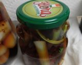 A picture of step 3 of Pickled Onion Tops.