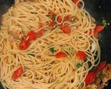 A picture of step 12 of Red snapper and tomato aglio e olio.