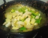 A picture of step 1 of Aloo Shimla mirch pyaz ki sabzi.