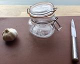 A picture of step 1 of Trick: How to peel a garlic (so your hands don’t smell of it).