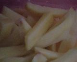 A picture of step 1 of Kfc style chicken garlic fries.