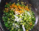 A picture of step 2 of Spring onion curry.