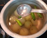 A picture of step 5 of Pickled Amla.