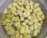 A picture of step 2 of Bombay masala potatoes.