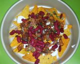A picture of step 5 of Loaded Cheesy nachos.