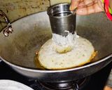 A picture of step 4 of Dibba roti or meenapa roti.