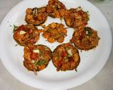 A picture of step 6 of Beguni ghoti gorom.