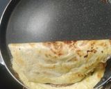 A picture of step 4 of Moong dal stuffed chilla/Crispy warp.