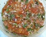 A picture of step 3 of Stuffed paneer paratha with tomato onion chutney.
