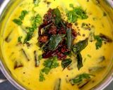 A picture of step 18 of Tamilnadu Thali - rice, sambar, mor kuzhambu, beetroot poriyal, payasam, buttermilk for lunch.