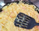 Foto del paso 4 de la receta: Tortilla de papa con jamón y cebolla