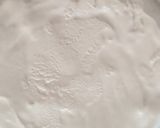 A picture of step 4 of Ice cream poke cake.