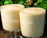 A picture of step 2 of Orange Banana Shake.
