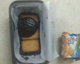 A picture of step 8 of Chocolate Biscuit Cake with Sugar coated Coconut Biscuits.