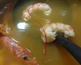 Foto del paso 2 de la receta: Salmón en salsa de naranja y marisco
