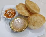 A picture of step 4 of Daal kachori with Tarkari.
