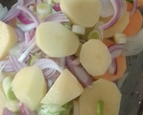 Foto del paso 3 de la receta: Chorizo bombón al horno🧅🥔🥔