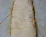 Foto del paso 3 de la receta: Trenza de hojaldre rellena de gambas y salmón