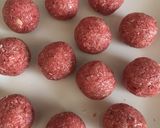 A picture of step 4 of Strawberry coconut balls.
