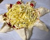 A picture of step 4 of Star Pizza.
