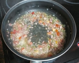 Foto del paso 3 de la receta: Garbanzos con longaniza fresca y huevos fritos