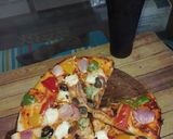 A picture of step 3 of Instant cheese burst pizza.