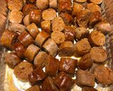 A picture of step 3 of Bite Sized Baked Sausages with Peppers and Onions.