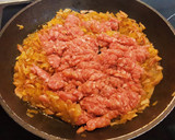 Foto del paso 4 de la receta: Piquillos rellenos de Carne con bechamel y queso gratinado