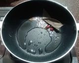 A picture of step 2 of Khatti meethi Aam aloo ki sabji.