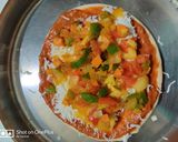 A picture of step 3 of Veg. Pizza.