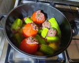 Une image de l'étape 9 de Courgettes et tomates farcies 🍴.