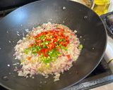 A picture of step 2 of Pork Belly Sisig Street Taco.