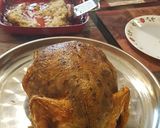 A picture of step 4 of Chicken stuffed with rice, potatoes and green peas.