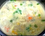 A picture of step 7 of Veggies Egg Drop Soup.