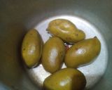 A picture of step 1 of Aam ka Panna🌺🍷🍷🍹.
