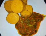 A picture of step 6 of Moin moin with palm oil sauce.
