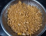 A picture of step 2 of Maharashtrian Phodnicha Masala Bhat.