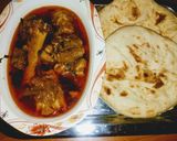 A picture of step 4 of Paye with tandori roti.