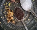 A picture of step 1 of Masala milk tea with spring onion pakoda.