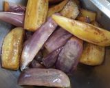 A picture of step 4 of Banana flowers dip in mustard seeds.