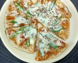 A picture of step 4 of Thin crust Cheese burst Pizza.