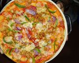 A picture of step 15 of Spicy Tikka pizza.