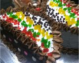 A picture of step 23 of Butterfly doll cake.